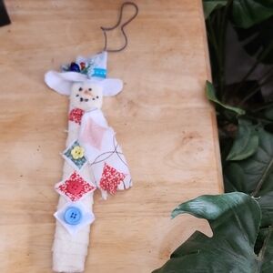Festive Snowman Ornament with Colorful Patchwork